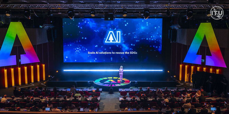 AI for Good Stage with the text written on the screen: "Scale AI solutions to rescue the SDGs"